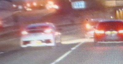 Speeding BMW driver caught out by police after 'flashing other motorists to move them out of the way' on M60