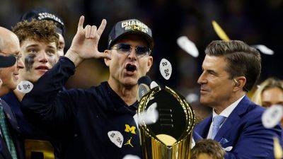 Michigan's Jim Harbaugh plays coy amid NFL rumors: 'I just want to enjoy this'