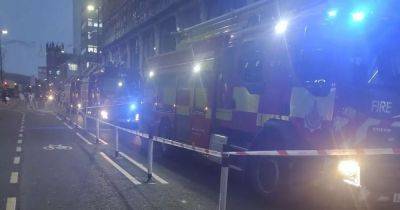 Fire crews descend on Deansgate in city centre with cordon in place after fire at former restaurant