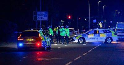 Woman killed in crash after being hit by car while crossing the road