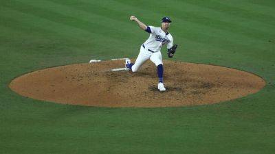 Dave Roberts - Will Smith - Max Scherzer - Jack Flaherty - Dodgers tie playoff scoreless innings mark in Game 1 rout of Mets - ESPN - espn.com - New York - Los Angeles - county San Diego