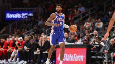 76ers star Paul George suffers hyperextended left knee - ESPN