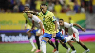 Raphinha's penalty double helps Brazil to 4-0 win over Peru