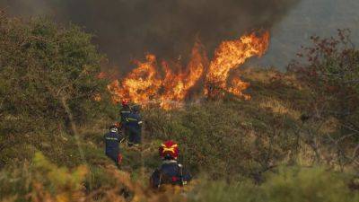 Wildfires in southern Greece continue to rage for third day