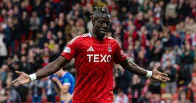 Pape Habib Gueye out for more than FOUR months as Aberdeen top scorer dealt injury hammer blow