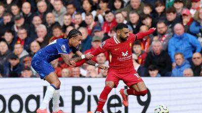 Liverpool pass Chelsea test with Jones winner