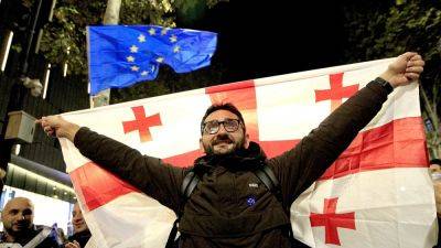 Thousands of Georgians join pro-EU march in Tbilisi ahead of next week's elections