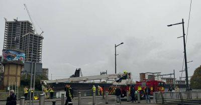 Woman taken to hospital after emergency services shut Cardiff city centre bridge