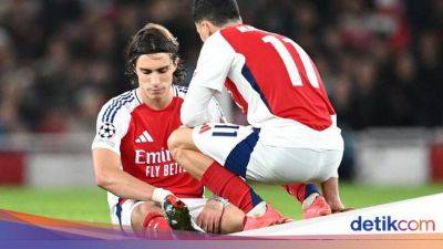 Mikel Arteta - Martin Odegaard - William Saliba - Riccardo Calafiori - Calafiori Cedera, Pusinglah Arteta - sport.detik.com - Liverpool