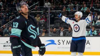 Connor Hellebuyck - Nikolaj Ehlers - Williams - Make it 7 straight: Winnipeg Jets keep rolling undefeated, edging Seattle in O/T - cbc.ca - Jordan