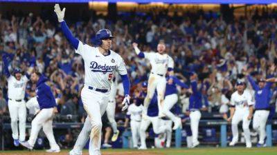 Freeman slugs walk-off grand slam in 10th as Dodgers top Yankees in thrilling World Series opener