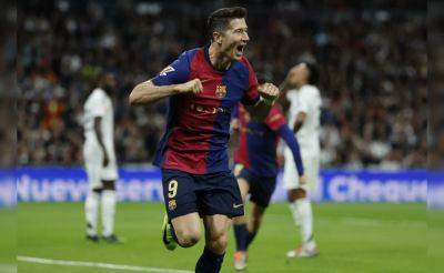 Bayern Munich - Robert Lewandowski - El Clasico - Carlo Ancelotti - Kylian Mbappe - Andriy Lunin - Hansi Flick - Flick of a switch for Lewandowski; Mbappe strays offside: 3 talking points as Barca demolish Real in Clasico - sports.ndtv.com - county Blanco