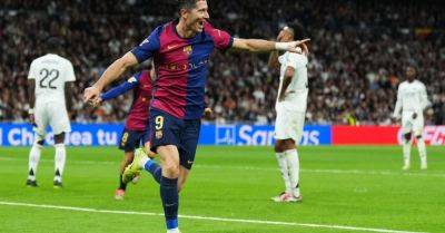 Barcelona thrash Real Madrid 4-0 at Bernabeu helped by Lewandowski double