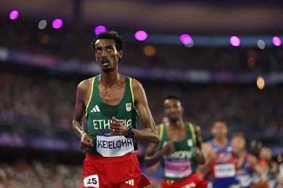 Ethiopia's Kejelcha breaks men's world half marathon record - news24.com - Ethiopia - county Valencia - Kenya - Uganda