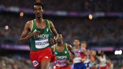 Ethiopian runner Yomif Kejelcha breaks the men's half-marathon world record - cbc.ca - Spain - Portugal - Ethiopia - county Valencia - state Indiana - Kenya - Uganda