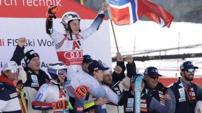 Alpine skiing-Steen Olsen leads Norwegian podium sweep in WC opener