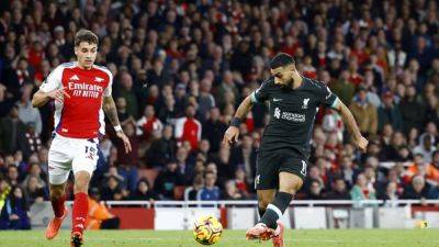 Salah's late equaliser earns Liverpool 2-2 draw at Arsenal