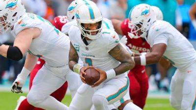 Tua Tagovailoa praised for protecting self in Dolphins' loss - ESPN