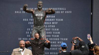 Heat unveil statue of Dwyane Wade outside team's arena - ESPN