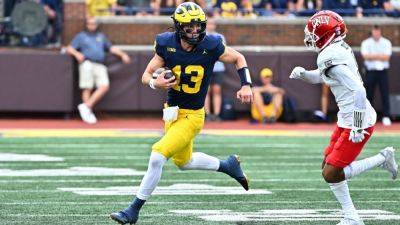 Michigan QB Jack Tuttle retires from football, cites health - ESPN