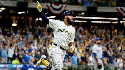 Brewers lean on HRs from Chourio, Mitchell to even series with Mets - ESPN