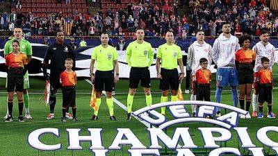 Champions League match refereed by identical twins - ESPN