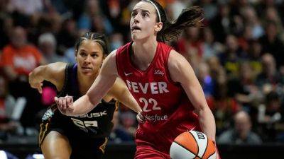 Fever star guard Caitlin Clark named WNBA top rookie in near-unanimous vote