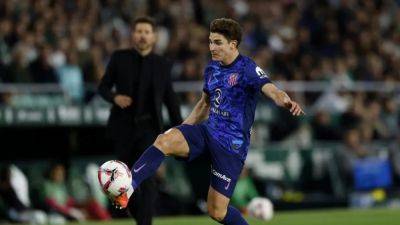 Atletico scrape past sixth-tier side in Cup with late Alvarez double