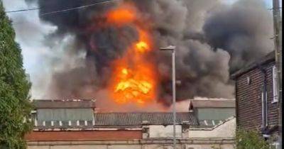 'It was chaos': Moment emergency crews descended on Manchester street as huge fire erupts