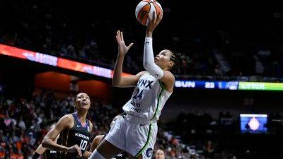 Diana Taurasi - Candace Parker - Marina Mabrey - Courtney Williams - Collier scores 26 to help Lynx overcome Sun to take 2-1 series lead in WNBA semifinal - cbc.ca - state Minnesota - state Connecticut