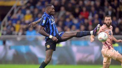 Thuram hat-trick gives Inter 3-2 win over 10-man Torino