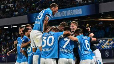 Napoli beat Como to hold top spot in Serie A