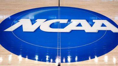 Settlement designed to pay college athletes gets preliminary approval - ESPN