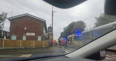 LIVE updates as car collides with tram and Metrolink services cancelled