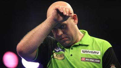 Michael van Gerwen crashes out of World Grand Prix