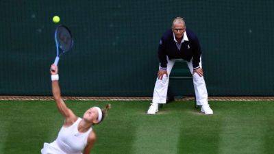 Out! Wimbledon calls time on line judges in favour of electronic system