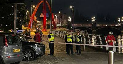 Two men 'brought to safety' after police seal off area near river in Newport city centre