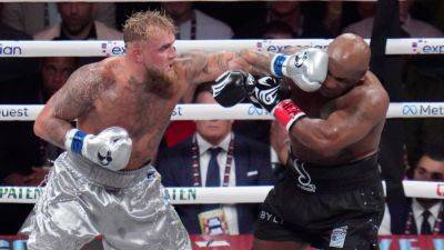 Jake Paul - Mike Tyson - Evander Holyfield - Jake Paul cruises to one-sided decision over Mike Tyson - ESPN - espn.com - state Texas - county Arlington - county Collin