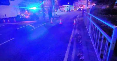 Major road in Bolton shut as man cut from car following crash - manchestereveningnews.co.uk - borough Manchester