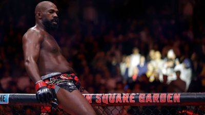 Jon Jones - Brett Okamoto - Charles Oliveira - Michael Chandler - UFC 309 results: Jon Jones retains with spinning back kick TKO over Stipe Miocic - ESPN - espn.com
