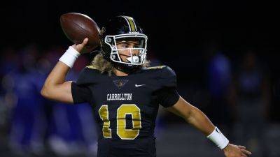 Sources: No. 2 '25 QB Julian Lewis decommits from USC - ESPN