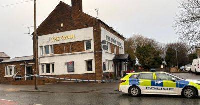 Man fighting for life after 'disturbance' as police tape off pub in Bury