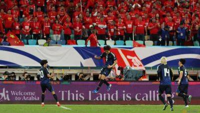 Ruthless Japan beat China to move to brink of World Cup qualification