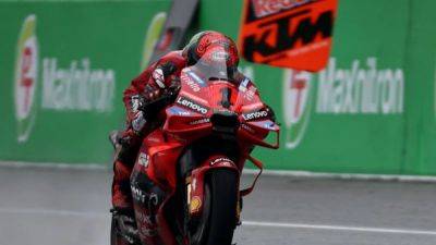 Bagnaia smashes lap record to storm to pole at Malaysian Grand Prix