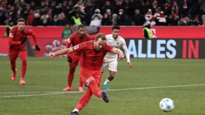 Bayern's Kane bags hat-trick in 3-0 win over Augsburg