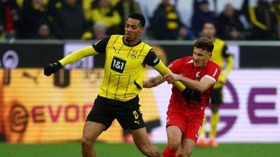 Dortmund crush Freiburg 4-0 to maintain perfect home record