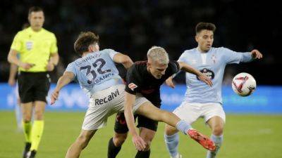 Celta fight back to hold 10-man Barca to 2-2 draw