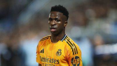 Real's Vinicius out of Champions League clash at Liverpool with injury