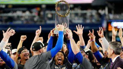 Dodgers split $46M from record MLB postseason pool of $129M - ESPN