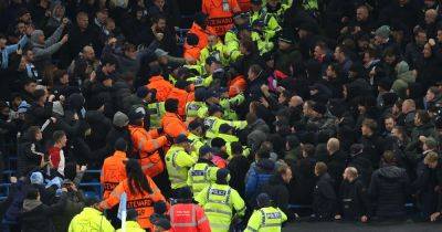 Objects thrown as Man City and Feyenoord fans clash during Champions League tie